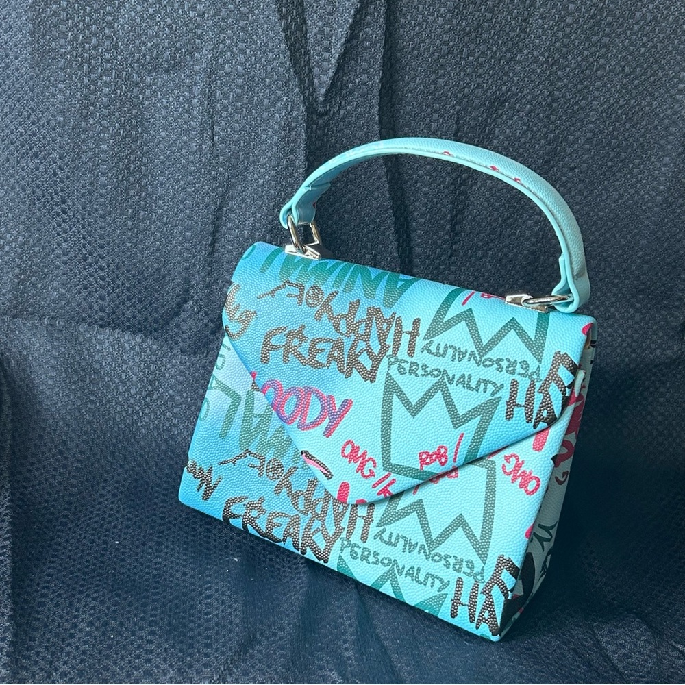 Stylish Blue Handbag with Graffiti Design